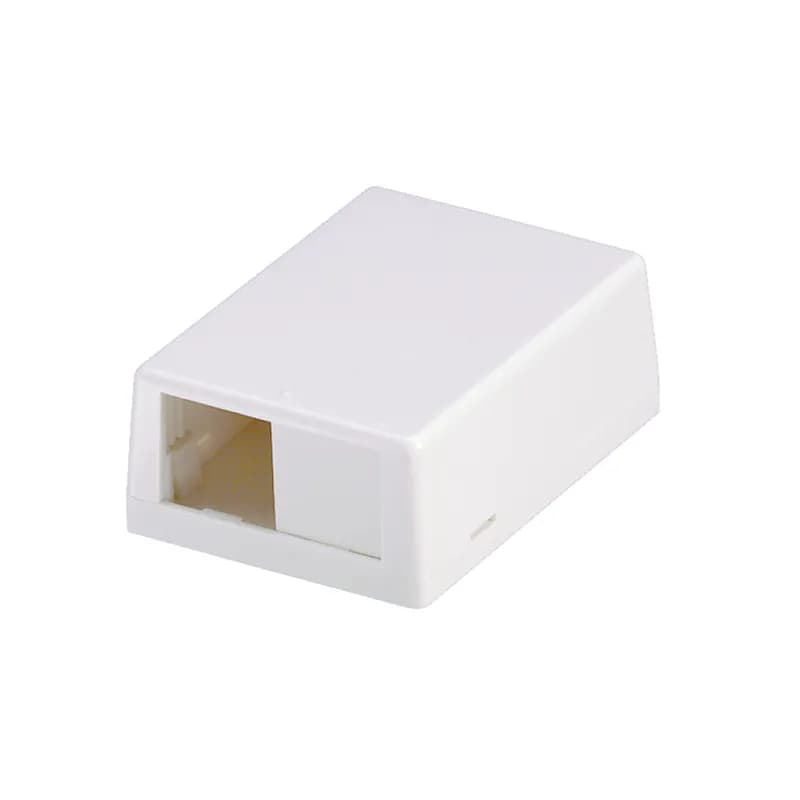Panduit CBXJ2IG-A - Mini-Com surface mount box accepts up to two Mini-Com Modules. Includes built-in removable blank. Supplied with adhesive backing. International Gray.