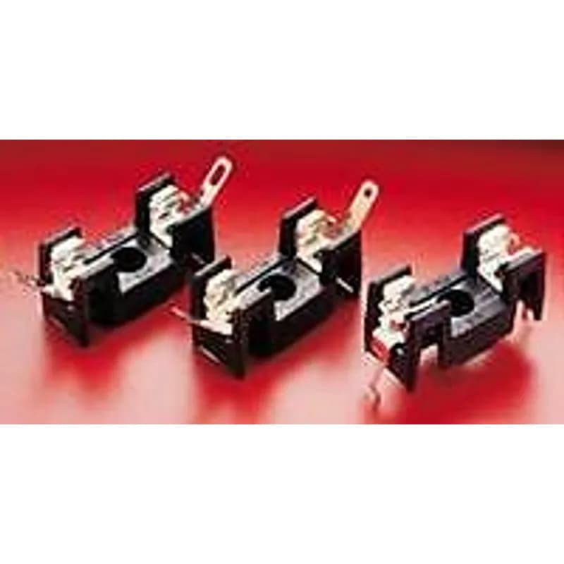 PC BOARD MOUNT FUSEHOLDER Q.C.. The metric Omni-Blok fuse block, for 5×20mm size fuses, is a low profile design that is available with a choice of solder type terminals, NEMA style QC terminals, or PC board mountable terminals. Each of these designs has tin plated brass terminals. A unique design feature provides self-alignment of the clips to the fuse caps. This feature, plus a one-piece clip/terminal design, assures low contact resistance. An anti-one-piece clip/terminal design, assures low contact resistance. An anti rotation feature is also available on the solder and QC terminal designs.