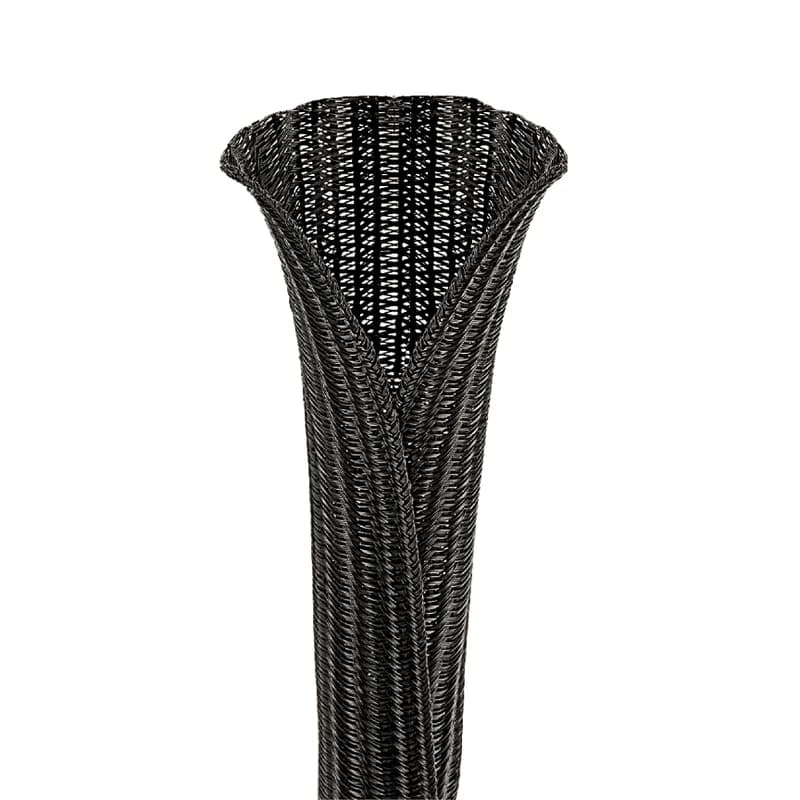The SE50PS-CLR0 Pan-Wrap Braided Sleeving allows for installation after wire or cable is routed and terminated. Ideal for applications where re-entry is required and provides continuous abrasion resistance for wires, cables, and tubing. The lightweight, durable protection is highly flexible, and the open weave will not trap heat or humidity. Temperature range: -94 F 257 F (-70 C 125 C). Polyethylene Terephthalate. Nominal Diameter: 0.50" (12.7 m), 150' (45.7 m) long. Color Black. 1 per package.