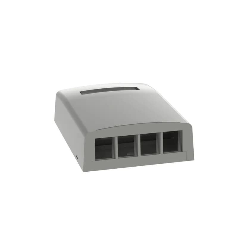 The NetKey Surface Mount Box accepts four keystone modules. The box offers a variety of mounting options using adhesive tape, screws, or optional magnet. The box can be identified with an adhesive label and is international gray.