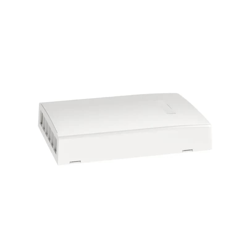 The NetKey Surface Mount Box accepts six keystone modules. The box offers a variety of mounting options using adhesive tape, screws, or optional magnet. The box can be identified with an adhesive label and is white.