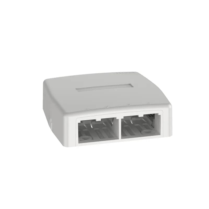 The Mini-Com Surface Mount Box is plenum rated and accepts four Mini-Com Modules. Cover has a quick release mechanism that allows easy access to the modules; cover can be secured with a screw. The box offers a variety of mounting options using adhesive tape, screws, or optional magnet. The box includes a label pocket for easy identification and is off white.