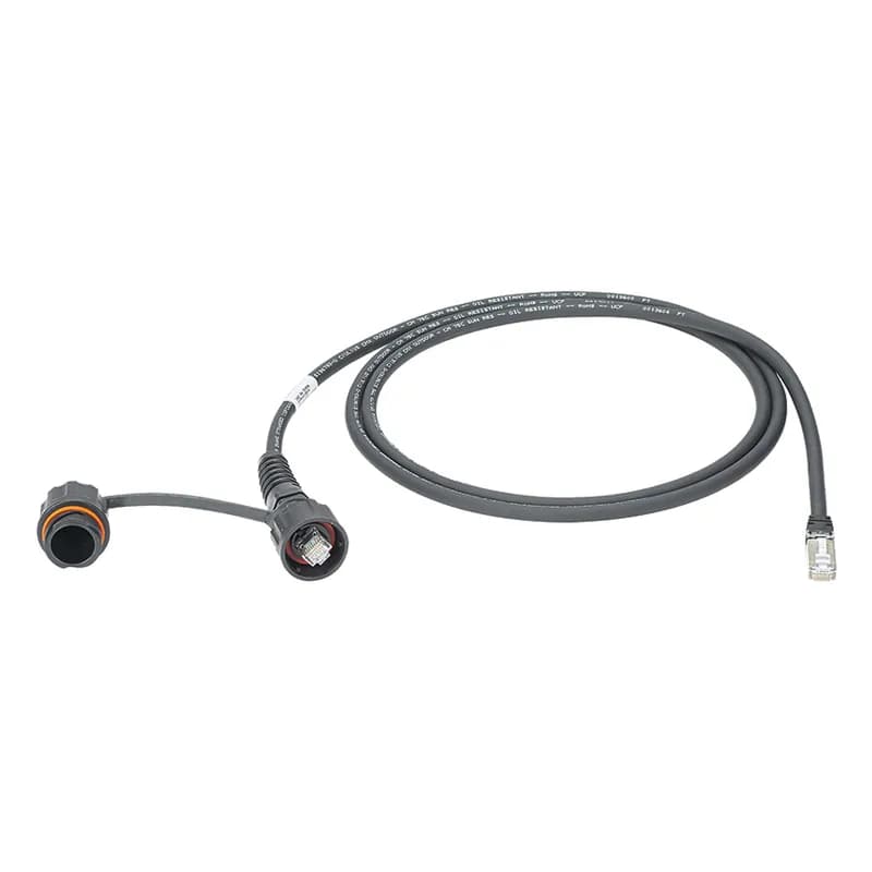 The IndustrialNet Cat 6A Unshielded Patch Cord is constructed of industrial grade, 24 AWG, U/UTP, twisted pair, stranded, CMR cable with IP67 industrial bulkhead modular connector with a single protective cap. It is designed to support high-flex applications and is rated for 600 V panel or on-machine applications where space is shared with high voltage power cables. The patch cord is 1 meter in length and black.