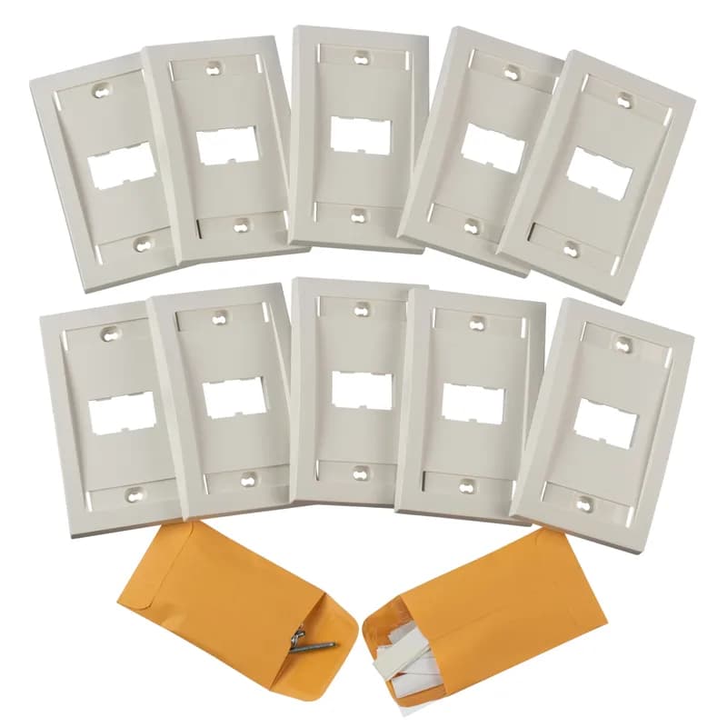 The Mini-Com Executive Series Faceplate accepts two Mini-Com Modules. The faceplate is single gang and mounts to a NEMA standard single gang opening. The faceplate includes a raised rail design on the outer edge of the frame, has a label pocket for easy identification, and is white.