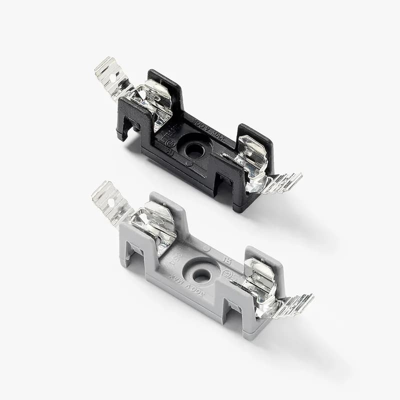 Littelfuse 354909-GY - ACS OMNI-BLOK MTG 9 POLE. A low profile fuse block featuring individual barriers which reinforce the fuse clips while providing greater protection against clip damage and electrical shock. The unique design permits self-alignment of clips to fuse cap. This, plus a one-piece clip/terminal assures low contact resistance. Higher current ratings have been attained using spring brass clips. With the exception of the two-pole unit, multiple pole units may be broken apart to obtain desired number of poles.
