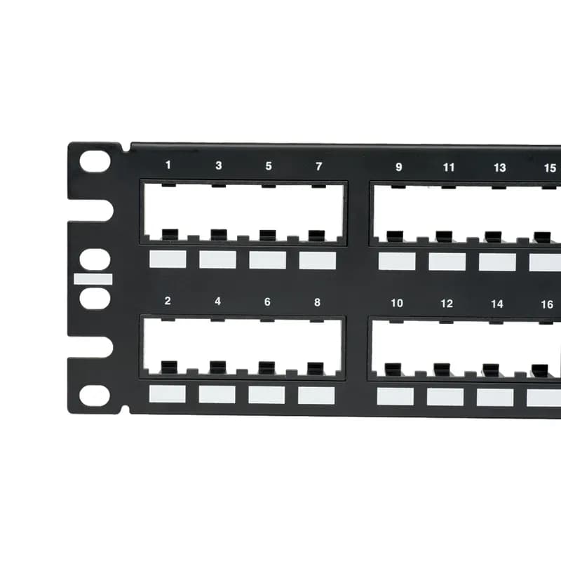 The Mini-Com Flush Mount Modular Patch Panel accepts up to 48 Mini-Com Modules for unshielded applications in 2 RU and mounts to 19 inch and 23 inch racks and cabinets. The patch panel includes pre-printed numbers that follow a vertical sequence, can be identified with adhesive labels and is black.
