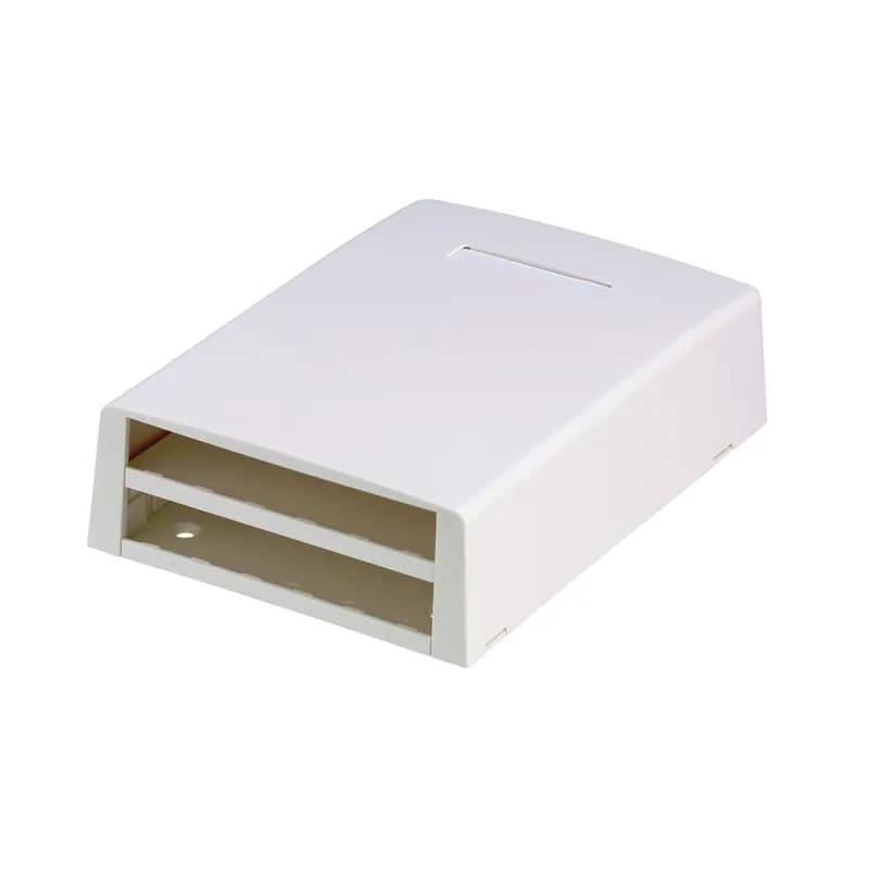 The Mini-Com Multimedia Surface Mount Box accepts twelve Mini-Com Modules. A built-in fiber spool in the base protects and secures cable slack in place. The box offers a variety of mounting options using adhesive tape or screws. The box includes a bridge, a label pocket for easy identification and is electric ivory.