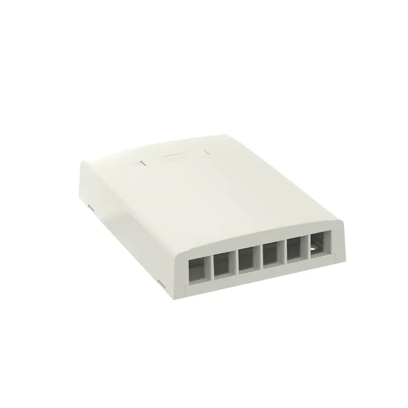 The NetKey Multimedia Surface Mount Box accepts six keystone modules. A built-in fiber spool in the base protects and secures cable slack in place. It offers a variety of mounting options using adhesive tape or screws. The box includes a label pocket for easy identification and is off white.
