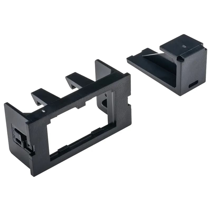 The Mini-Com adapter for Interlink frames, accepts two Mini Com modules, each adapter includes one black blank module and adapter is black.
