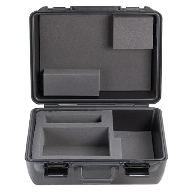 Hardside carrying case accommodates printer, AC power adapter, ribbons, printer cable, external roll stand, labels, and tools.