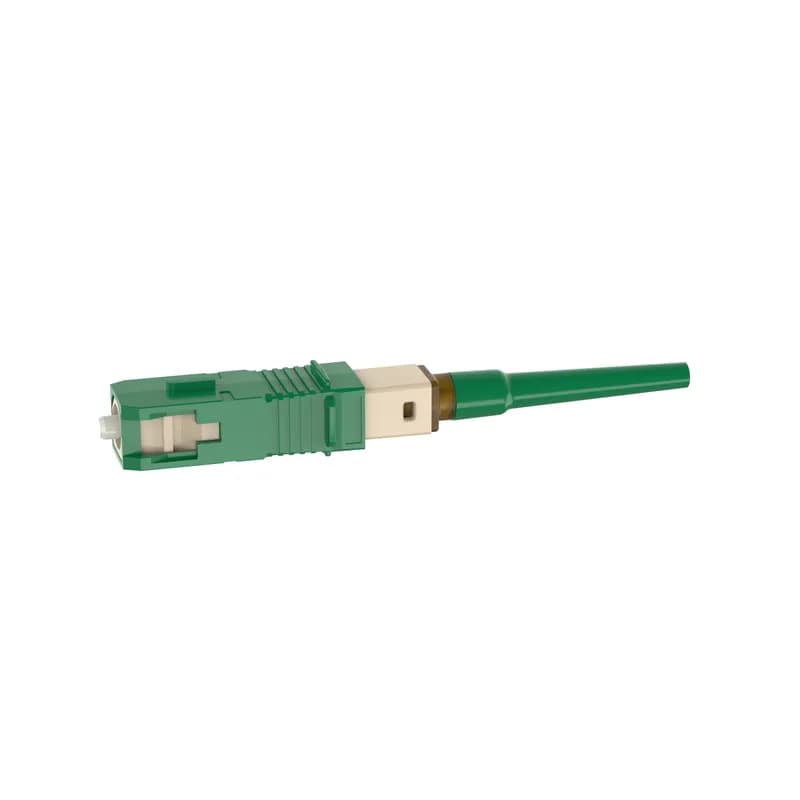 The OmniSplice SC-APC Fiber Optic Connector is a singlemode 9/125?m OS2 simplex fiber connector. Termination can be done in about two minutes on several common splice machine brands. The connector consists of a ferrule assembly with a bare fiber stub, a green front housing, a rear housing with integral green boot, and a splice protection sleeve.
